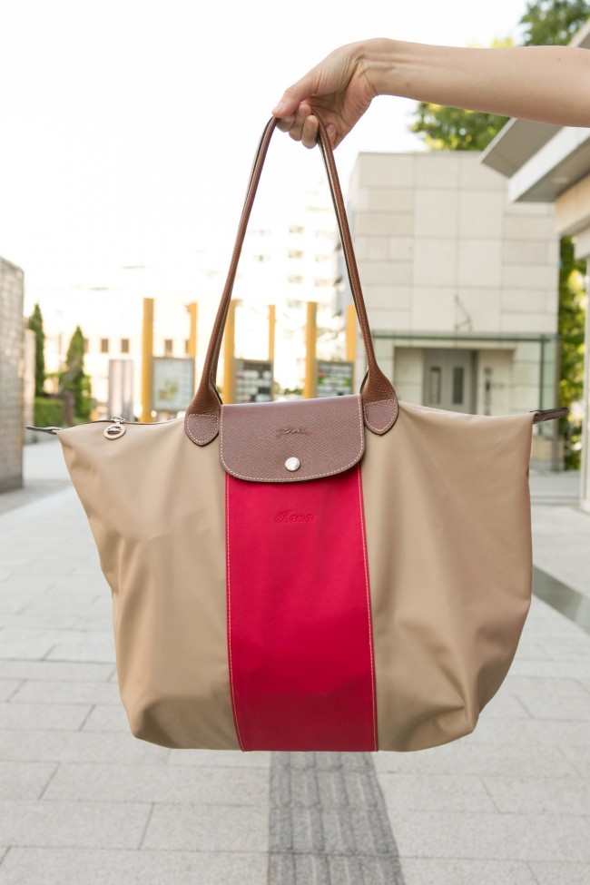 どんなテイストにも合う、ピンク✖️ベージュをチョイス。名前の刺繍を同色であわせて主張しすぎないように◎